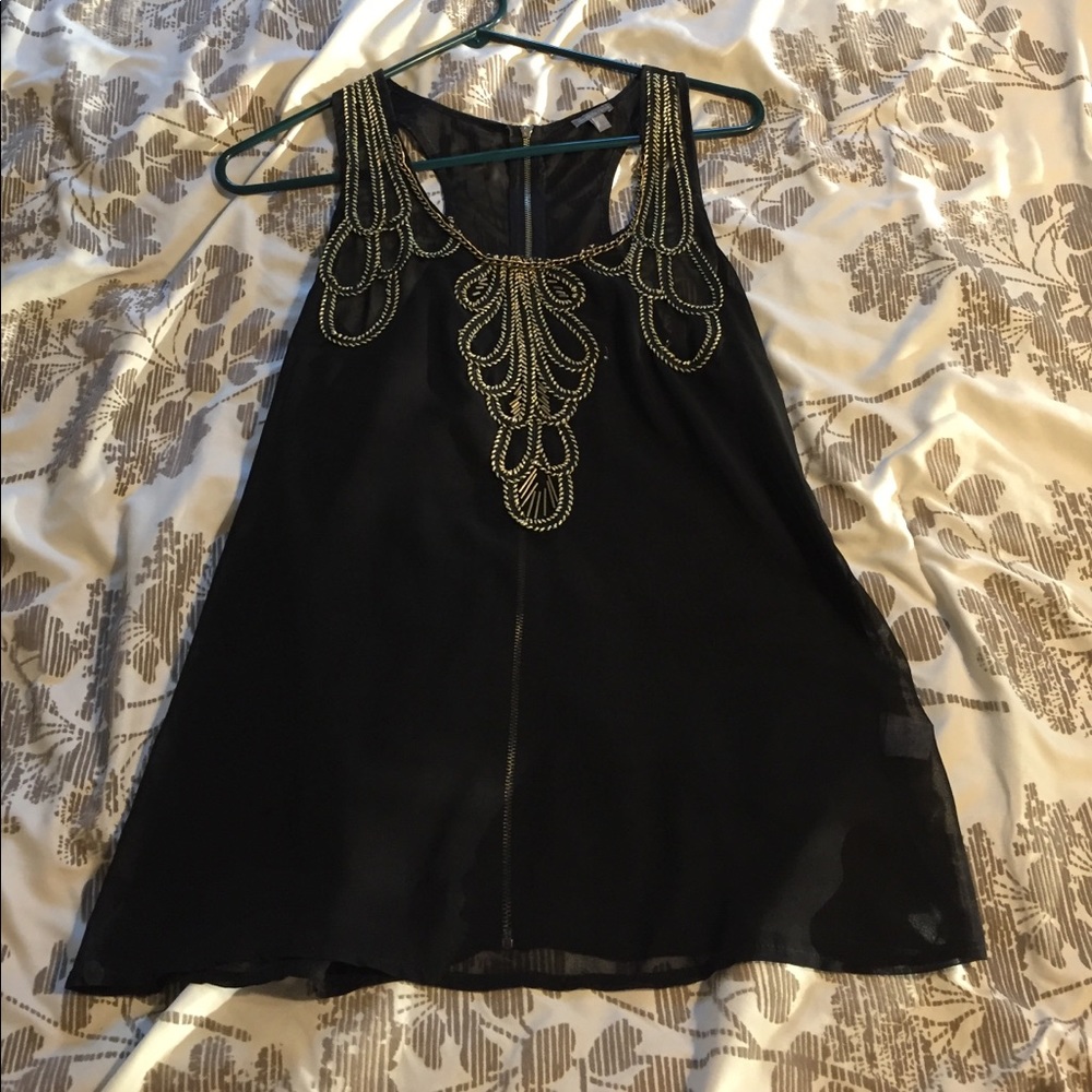 Black and gold tunic
